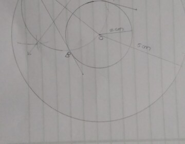 Draw two concentric circles of radii 2 cm and 5 cm. Take a point P on the outer circle and construct a pair of tangents PA and PB to the smaller circle. Measure PA.